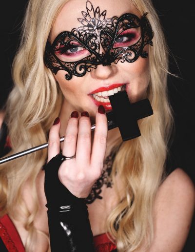 crucifix blond masked dominatrix